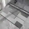 Dywanik łazienkowy antracyt z geometrycznym wzorem
